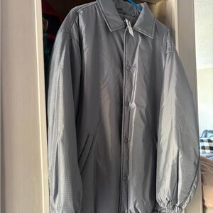 TNA Light Blue/Grey Coach’s Jacket with Relaxed Fit and Pointed Collar